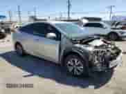 2018 Toyota Prius Plus z VIN JTDKARFP7J3099284, wystawiony jako Copart lot #58186915 z przebiegiem 51 694 mil mil oraz Szkoda całkowita • Salvage title. Historia ofert i sprzedaży dostępna na DreamBid. Obrazek 4.