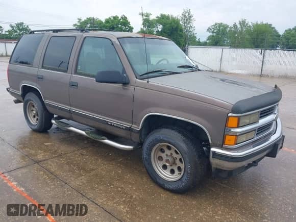 1998 Chevrolet Tahoe with VIN 1GNEK13R7WJ350185, listed as a IAAI auction lot 42410669 with 171,129 mi miles and . Bid and sale history available at DreamBid. Image 1.