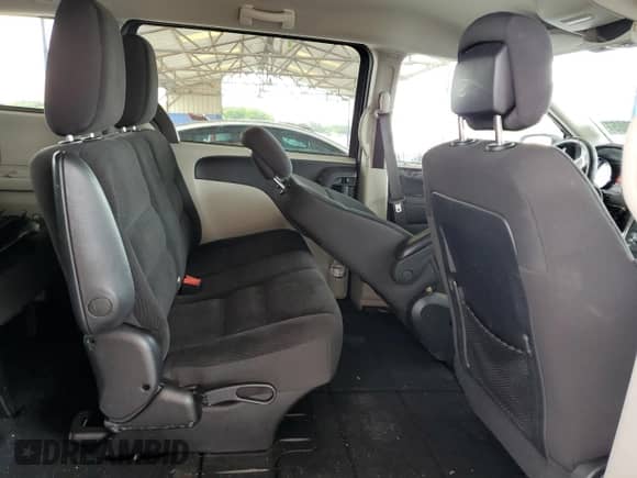 2019 Dodge Grand Caravan SE с VIN 2C4RDGBG2KR739166, выставлен на аукционе Copart как лот 84647805 с пробегом 78 254 миль миль и Списание • Salvage title. История ставок и продаж доступна на DreamBid. Изображение 11.