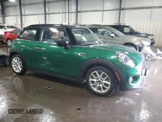 2020 MINI Hardtop Cooper with VIN WMWXR3C05L2M04273, listed as a Copart auction lot 59867245 with 21,750 mi miles and Salvage title. Bid and sale history available at DreamBid. Image 4.