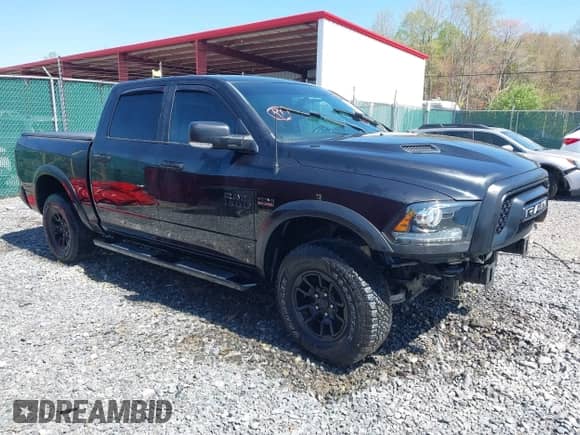 2018 Ram 1500 Rebel with VIN 1C6RR7YT4JS145768, listed as a IAAI auction lot 41593734 with 66,820 mi miles and . Bid and sale history available at DreamBid. Image 1.