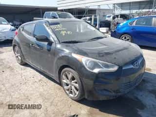 2016 Hyundai Veloster with VIN KMHTC6AD0GU256386, listed as a IAAI auction lot 43146464 with 75,645 mi miles and . Bid and sale history available at DreamBid. Image 1.