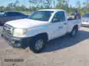 2009 Toyota Tacoma z VIN 5TENX22N79Z670356, wystawiony jako IAAI lot #43190438 z przebiegiem 236 526 mil mil oraz . Historia ofert i sprzedaży dostępna na DreamBid. Obrazek 17.