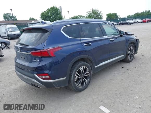 2020 Hyundai Santa Fe SEL with VIN 5NMS3CAA7LH296888, listed as a IAAI auction lot 42442612 with 71,216 mi miles and . Bid and sale history available at DreamBid. Image 4.