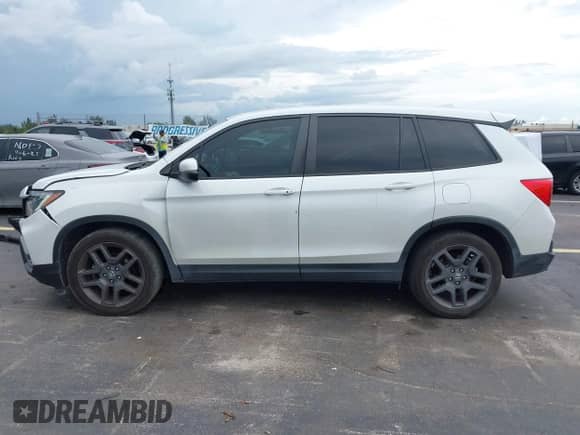 2022 Honda Passport EX-L с VIN 5FNYF7H53NB005258, выставлен на аукционе IAAI как лот 43291545 с пробегом 82 070 миль миль и . История ставок и продаж доступна на DreamBid. Изображение 14.