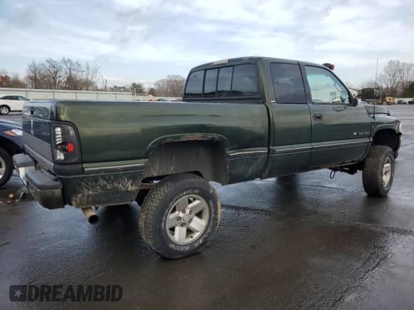 1997 Dodge 1500 z VIN 3B7HF13Y1VG723030, wystawiony jako Copart lot #85461054 z przebiegiem 218 671 mil mil oraz Szkoda całkowita • Salvage title. Historia ofert i sprzedaży dostępna na DreamBid. Obrazek 3.