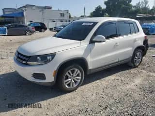 2014 Volkswagen Tiguan SEL with VIN WVGAV3AX3EW512127, listed as a Copart auction lot 70268245 with 28,429 mi miles and Salvage title. Bid and sale history available at DreamBid. Image 1.