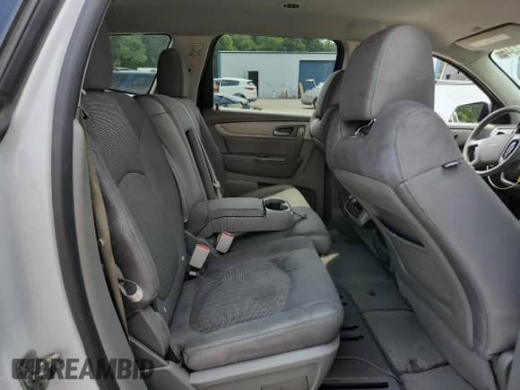2016 Chevrolet Traverse LS с VIN 1GNKRFED6GJ247936, выставлен на аукционе Copart как лот 70658345 с пробегом 169 872 миль миль и Списание • Salvage title. История ставок и продаж доступна на DreamBid. Изображение 11.
