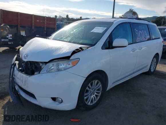 2013 Toyota Sienna XLE AAS with VIN 5TDYK3DC8DS324853, listed as a IAAI auction lot 41647704 with 143,656 mi miles and . Bid and sale history available at DreamBid. Image 17.