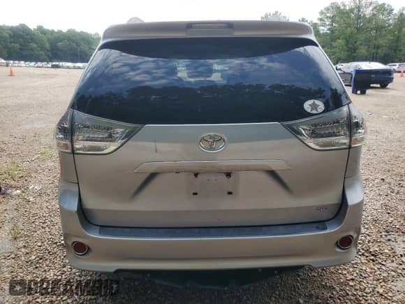 2012 Toyota Sienna SE with VIN 5TDXK3DCXCS232461, listed as a Copart auction lot 64729635 with 128,192 mi miles and Salvage title. Bid and sale history available at DreamBid. Image 6.
