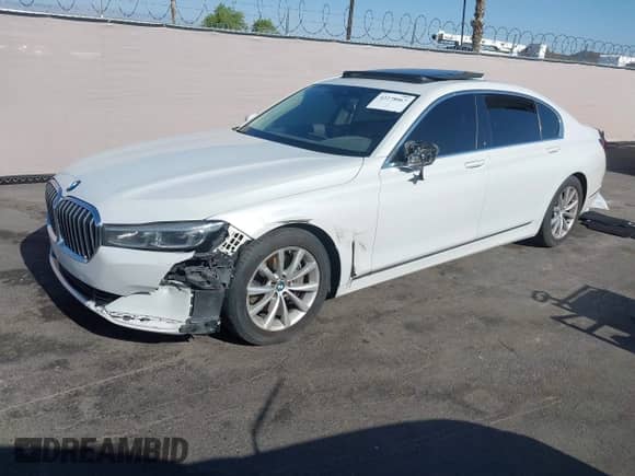 2020 BMW 7 Series 740i z VIN WBA7T2C0XLGL17774, wystawiony jako IAAI lot #42278067 z przebiegiem 100 465 mil mil oraz . Historia ofert i sprzedaży dostępna na DreamBid. Obrazek 2.