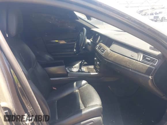 2013 BMW 7 Series 750i with VIN WBAYA8C57DC996601, listed as a IAAI auction lot 42497017 with 137,222 mi miles and . Bid and sale history available at DreamBid. Image 5.