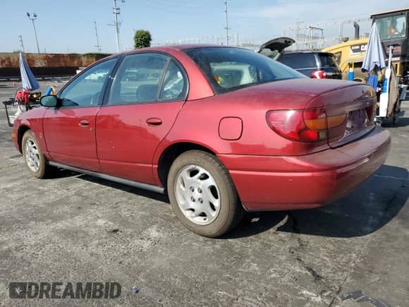 2000 Saturn SL with VIN 1G8ZK527XYZ209238, listed as a Copart auction lot 67659845 with 195,212 mi miles and Clean title. Bid and sale history available at DreamBid. Image 2.
