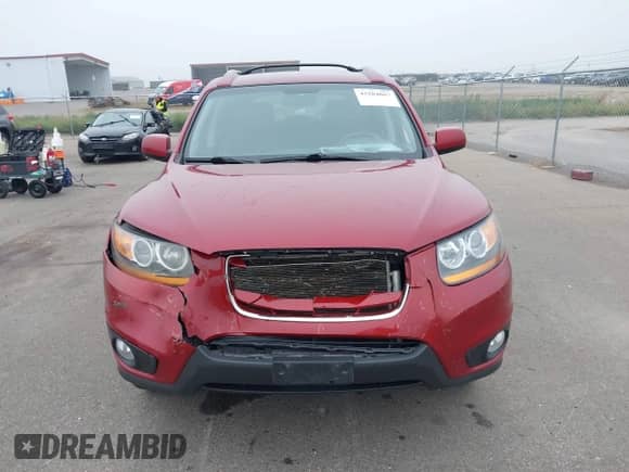 2011 Hyundai Santa Fe SE with VIN 5XYZHDAG1BG076925, listed as a IAAI auction lot 43204667 with 320,107 mi miles and . Bid and sale history available at DreamBid. Image 12.