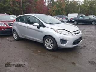 2011 Ford Fiesta SE with VIN 3FADP4EJ5BM125572, listed as a IAAI auction lot 43452327 with 95,912 mi miles and . Bid and sale history available at DreamBid. Image 1.