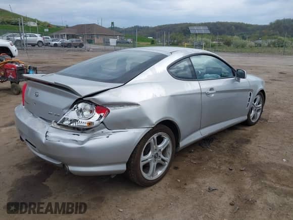 2006 Hyundai Tiburon GT с VIN KMHHN65F56U190508, выставлен на аукционе IAAI как лот 42107641 с пробегом 175 496 миль миль и . История ставок и продаж доступна на DreamBid. Изображение 4.