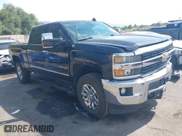 2015 Chevrolet Silverado 3500HD with VIN 1GC1K0EG5FF512945, listed as a IAAI auction lot 43138447 with 91,028 mi miles and . Bid and sale history available at DreamBid. Image 1.