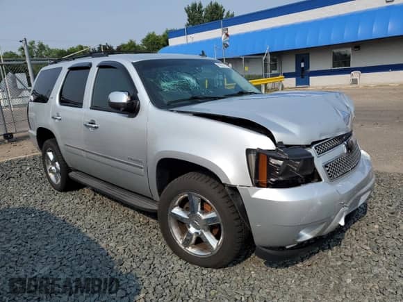 2014 Chevrolet Tahoe LTZ с VIN 1GNSKCE00ER134546, выставлен на аукционе Copart как лот 66233275 с пробегом 211 609 миль миль и Списание • Salvage title. История ставок и продаж доступна на DreamBid. Изображение 4.