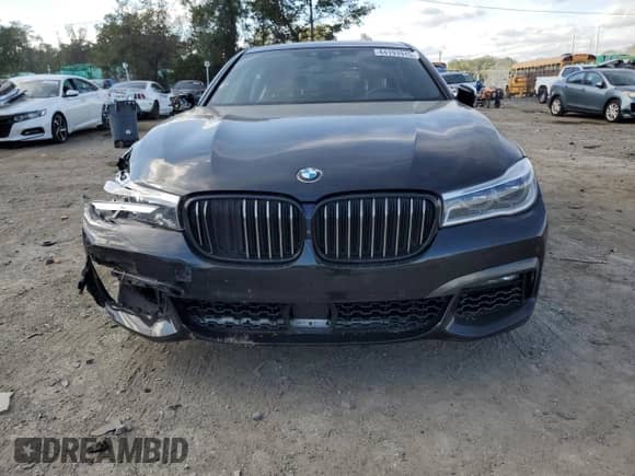 2019 BMW 7 Series 750i xDrive with VIN WBA7F2C58KB240403, listed as a Copart auction lot 84191915 with 56,854 mi miles and Salvage title. Bid and sale history available at DreamBid. Image 5.