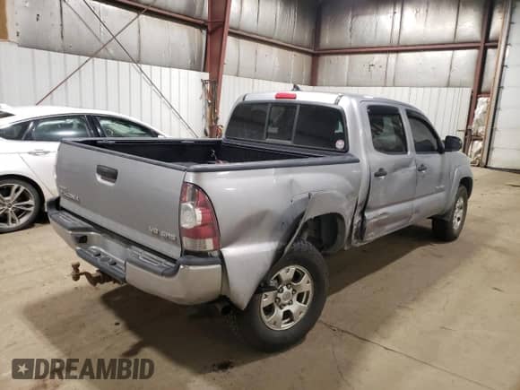 2014 Toyota Tacoma z VIN 3TMLU4EN1EM145145, wystawiony jako Copart lot #70778495 z przebiegiem 169 209 mil mil oraz Szkoda całkowita • Salvage title. Historia ofert i sprzedaży dostępna na DreamBid. Obrazek 3.