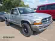 2001 Dodge Dakota Sport with VIN 1B7GG22N11S128929, listed as a IAAI auction lot 43228896 with 267,995 mi miles and . Bid and sale history available at DreamBid. Image 1.