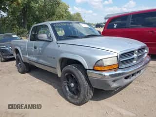 2001 Dodge Dakota Sport with VIN 1B7GG22N11S128929, listed as a IAAI auction lot 43228896 with 267,995 mi miles and . Bid and sale history available at DreamBid. Image 1.