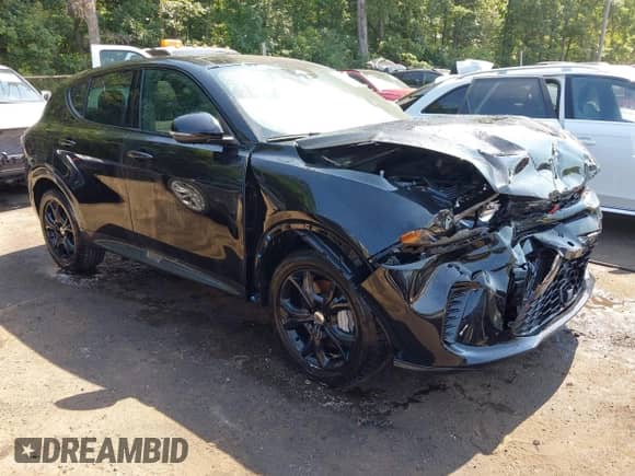 2024 Dodge Hornet R/T Plus z VIN ZACPDFDW3R3A23016, wystawiony jako IAAI lot #42822677 z przebiegiem 14 841 mil mil oraz . Historia ofert i sprzedaży dostępna na DreamBid. Obrazek 1.