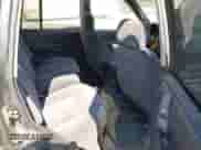 1996 Jeep Grand Cherokee Laredo z VIN 1J4GZ58SXTC280868, wystawiony jako IAAI lot #42653608 z przebiegiem 188 867 mil mil oraz . Historia ofert i sprzedaży dostępna na DreamBid. Obrazek 8.