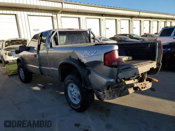 1999 Chevrolet S-10 LS ZR2 z VIN 1GCCT19W9X8172556, wystawiony jako Copart lot #42104095 z przebiegiem 162 970 mil mil oraz Szkoda całkowita • Salvage title. Historia ofert i sprzedaży dostępna na DreamBid. Obrazek 2.