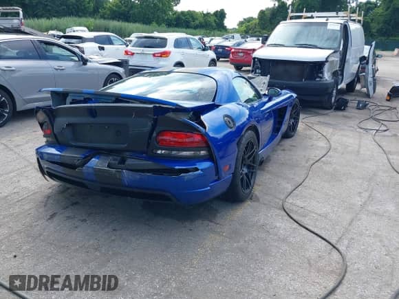 2006 Dodge Viper with VIN 1B3JZ69Z86V100567, listed as a IAAI auction lot 42706731 with 48,636 mi miles and . Bid and sale history available at DreamBid. Image 4.