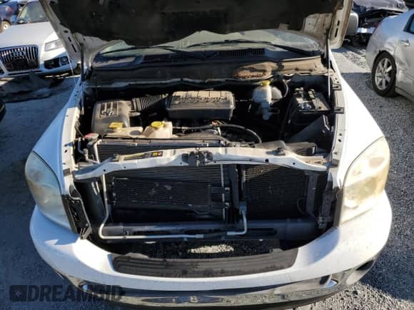 2007 Dodge 1500 ST z VIN 1D7HU18P77J517398, wystawiony jako Copart lot #75881114 z przebiegiem 195 380 mil mil oraz Szkoda całkowita • Salvage title. Historia ofert i sprzedaży dostępna na DreamBid. Obrazek 11.