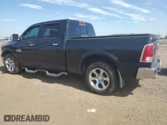 2014 Ram 1500 Laramie z VIN 1C6RR7VM8ES434901, wystawiony jako Copart lot #65967775 z przebiegiem 111 433 mil mil oraz Czysty tytuł • Clean title. Historia ofert i sprzedaży dostępna na DreamBid. Obrazek 2.