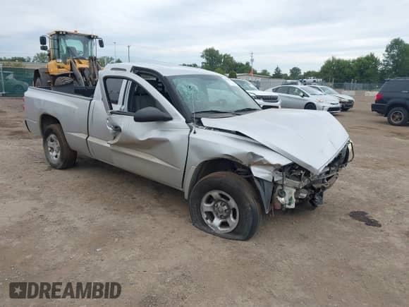 2005 Dodge Dakota ST z VIN 1D7HE22KX5S309314, wystawiony jako IAAI lot #39829662 z przebiegiem Nie podano mil oraz . Historia ofert i sprzedaży dostępna na DreamBid. Obrazek 1.