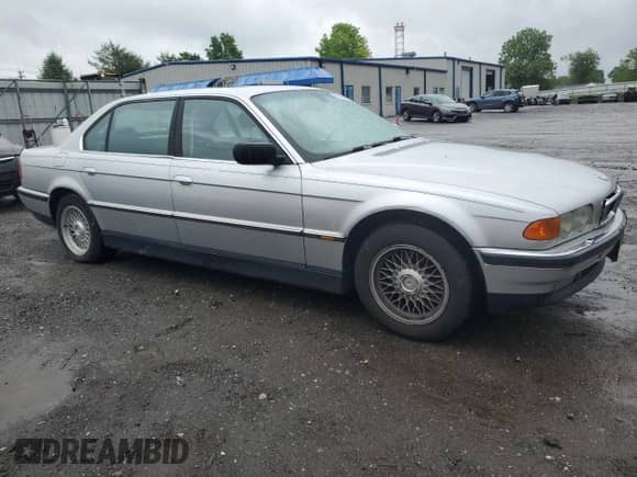 2000 BMW 7 Series 740iL with VIN WBAGH8346YDP11594, listed as a Copart auction lot 56964665 with 165,495 mi miles and Clean title. Bid and sale history available at DreamBid. Image 4.