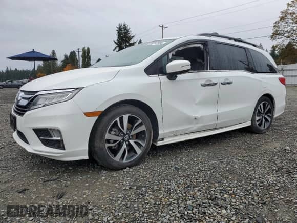 2020 Honda Odyssey Elite z VIN 5FNRL6H94LB033044, wystawiony jako Copart lot #89712385 z przebiegiem Nie podano mil oraz Szkoda całkowita • Salvage title. Historia ofert i sprzedaży dostępna na DreamBid. Obrazek 1.