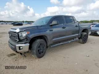 2020 Toyota Tundra SR5 with VIN 5TFDY5F15LX945111, listed as a Copart auction lot 70679165 with 147,342 mi miles and Salvage title. Bid and sale history available at DreamBid. Image 1.