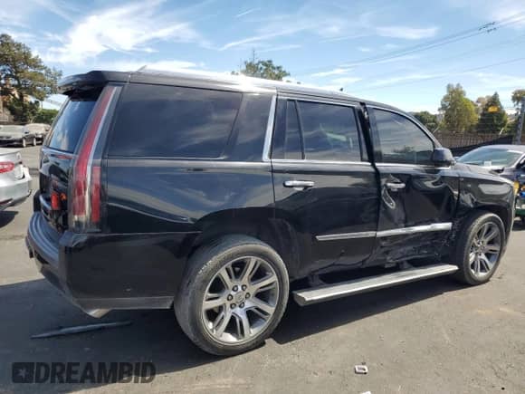 2015 Cadillac Escalade Premium с VIN 1GYS3CKJ7FR308532, выставлен на аукционе Copart как лот 65614885 с пробегом 52 819 миль миль и Списание • Salvage title. История ставок и продаж доступна на DreamBid. Изображение 3.