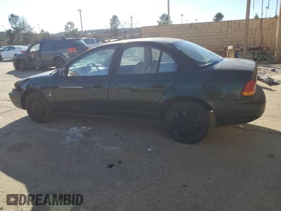 1997 Saturn SL with VIN 1G8ZH5281VZ133993, listed as a Copart auction lot 87155774 with 135,932 mi miles and Salvage title. Bid and sale history available at DreamBid. Image 2.