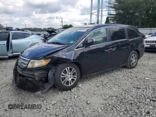 2012 Honda Odyssey EX with VIN 5FNRL5H40CB137318, listed as a Copart auction lot 64312265 with 145,964 mi miles and Salvage title. Bid and sale history available at DreamBid. Image 1.