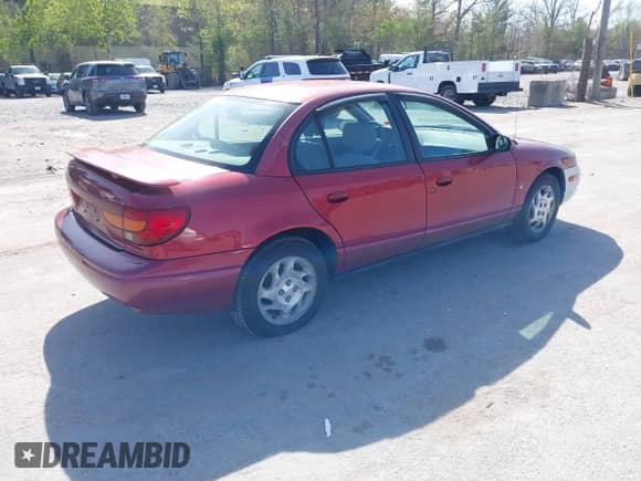 2000 Saturn SL with VIN 1G8ZK5274YZ241392, listed as a IAAI auction lot 42168456 with 99,406 mi miles and . Bid and sale history available at DreamBid. Image 4.