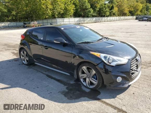 2013 Hyundai Veloster Turbo с VIN KMHTC6AE0DU148225, выставлен на аукционе Copart как лот 80101495 с пробегом 140 047 миль миль и Чистый • Clean title. История ставок и продаж доступна на DreamBid. Изображение 4.