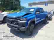 2025 Chevrolet Colorado 4WD Trail Boss with VIN 1GCPTEEK6S1154965, listed as a IAAI auction lot 42786786 with 3,495 mi miles and . Bid and sale history available at DreamBid. Image 2.