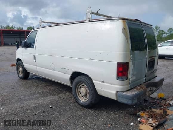 2004 Ford Econoline Cargo with VIN 1FTRE14W74HA04549, listed as a IAAI auction lot 43408922 with 316,245 mi miles and . Bid and sale history available at DreamBid. Image 3.