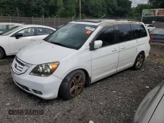 2008 Honda Odyssey Touring с VIN 5FNRL38838B005796, выставлен на аукционе Copart как лот 64416945 с пробегом Не указан миль и Списание • Salvage title. История ставок и продаж доступна на DreamBid. Изображение 1.