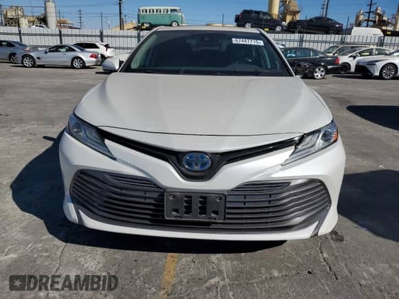 2019 Toyota Camry Hybrid LE с VIN 4T1B21HK2KU512669, выставлен на аукционе Copart как лот 67447715 с пробегом 141 772 миль миль и Списание • Salvage title. История ставок и продаж доступна на DreamBid. Изображение 5.