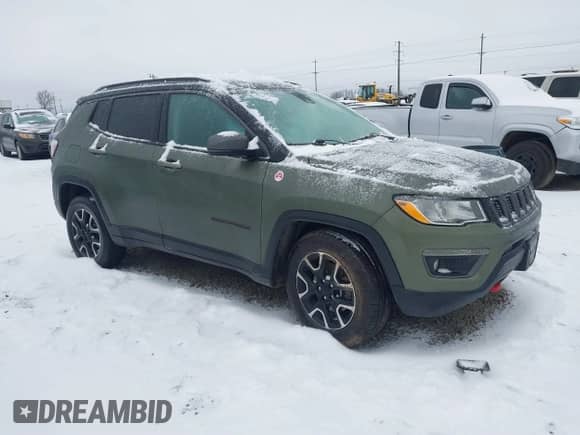 2021 Jeep Compass Trailhawk z VIN 3C4NJDDB7MT598103, wystawiony jako IAAI lot #41478590 z przebiegiem 95 036 mil mil oraz . Historia ofert i sprzedaży dostępna na DreamBid. Obrazek 1.