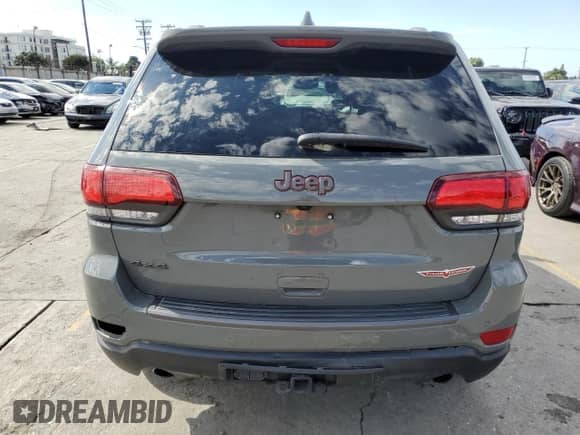2021 Jeep Grand Cherokee Trailhawk z VIN 1C4RJFLG1MC527534, wystawiony jako Copart lot #86185005 z przebiegiem 69 539 mil mil oraz Szkoda całkowita • Salvage title. Historia ofert i sprzedaży dostępna na DreamBid. Obrazek 6.