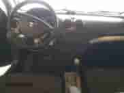 2007 Chevrolet Aveo LS z VIN KL1TD56697B119021, wystawiony jako Copart lot #67127784 z przebiegiem 178 885 mil mil oraz Szkoda całkowita • Salvage title. Historia ofert i sprzedaży dostępna na DreamBid. Obrazek 8.