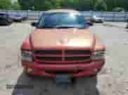 1998 Dodge Durango with VIN 1B4HS28Y0WF110147, listed as a Copart auction lot 57769495 with 316,913 mi miles and Salvage title. Bid and sale history available at DreamBid. Image 5.