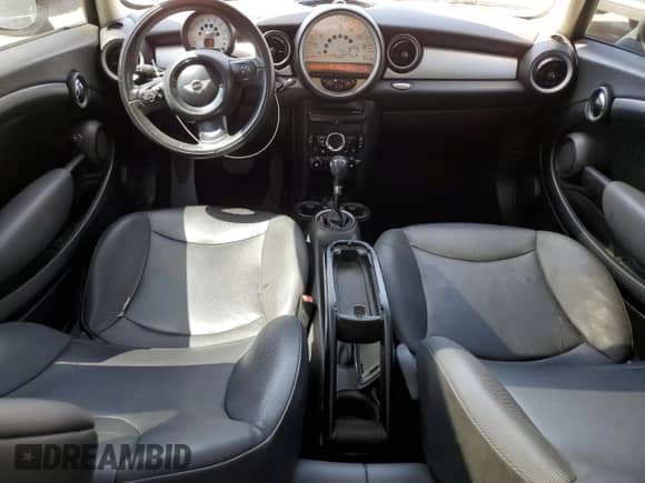 2013 MINI Hardtop with VIN WMWSU3C52DT680782, listed as a Copart auction lot 61779515 with 94,378 mi miles and Salvage title. Bid and sale history available at DreamBid. Image 8.